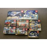 A collection of nine boxed Lego kits inc