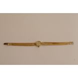 A ladies 9ct gold omega wristwatch