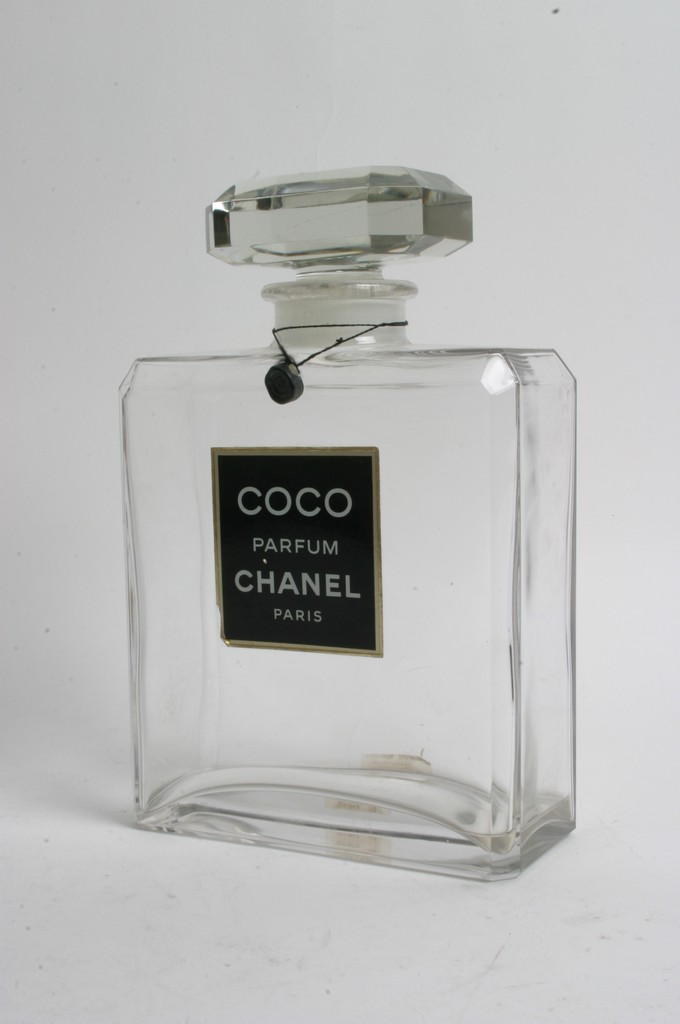 A Large Empty Coco Chanel Perfume Display Bottle With Original