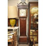 An oak 19th century long case clock with a painted dial and 30 hour movement with weight and