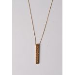 A 9ct gold pendant and chain