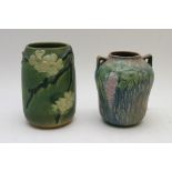 Two 1930's art pottery vases decorated in relief