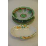 A Shelley porcelain cress strainer and stand and a clarice cliff dish (2)