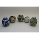 A collection of 20th century Chinese ginger jars and covers