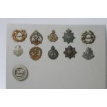 A collection of 11 Hampshire regiment related badges including HPC,