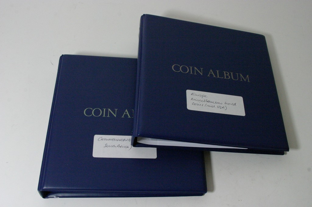 Two blue albums containing commonwealth and European coinage, - Image 2 of 2