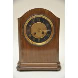 An Edwardian mahogany mantel clock,