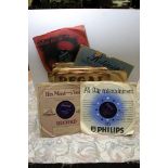 A box of 78 rpm records including Bill Haley, Jerry Lee Lewis, Elvis,