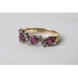 A 9ct gold ruby and diamond ring with alternating stones
