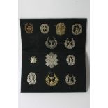 A collection of 12 various Highlanders badges including Aberdeenshire,