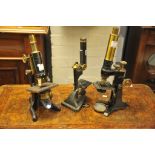 A collection of 3 microscopes including W Watson & Son