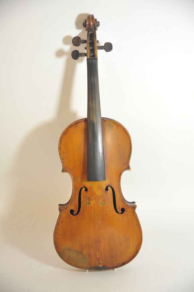 A 19th Century interesting violin, label for Gulio Degani plus a silver mounted bow,