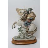 A Capodimonte figure of Napoleon on horseback signed Redaelli.