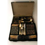 A Westminster gold plated cutlery set in fitted briefcase.