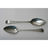 An attractive pair of silver Georgian bright cut tablespoons bearing London hallmarks