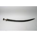 A middle eastern sword with a brass grip