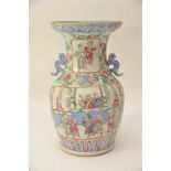 A Chinese Canton vase painted with warriors. Approximately 31.5cm.