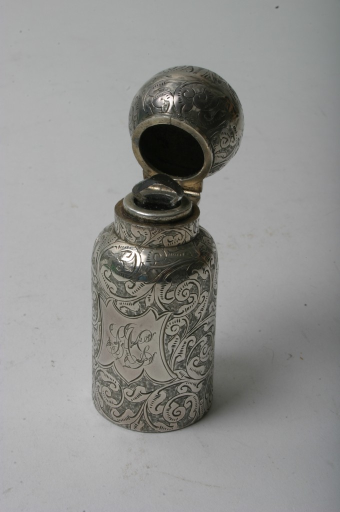 A Victorian silver scent bottle with engraved scrolled decoration, - Image 2 of 2