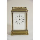 An oxidised brass carriage clock with strike repeat