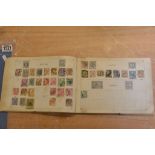 An early stamp album 'The Utile Stamp Album' containing various Stamps including pre-war German,
