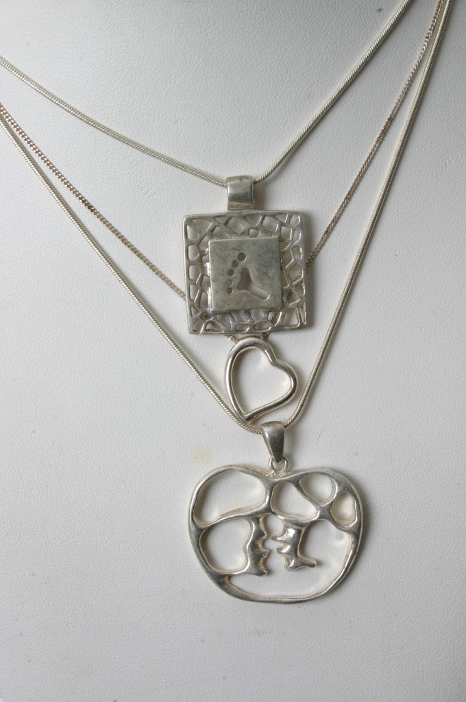 Three contemporary silver necklaces