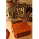 An early 19th century inlaid satinwood box and an ornate brass table mirror (2)