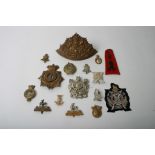 A bag of 16 various badges etc,