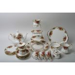 A Royal Albert Country Rose pattern six piece teaset