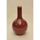 An early 20th century Chinese Sang de Boeuf bottle vase,