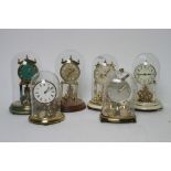 A collection of seven anniversary clocks, various makers.