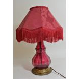 A Victorian style Bohemian glass side lamp with gilt metal base