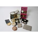 A small collection of costume jewellery and compacts