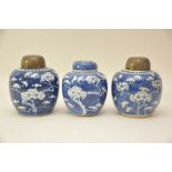 Three Chinese ginger jars decorated with peonies