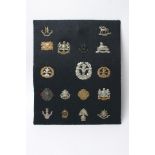 A collection of 17 volunteer battalion infantry regiment badges including retrospective copies