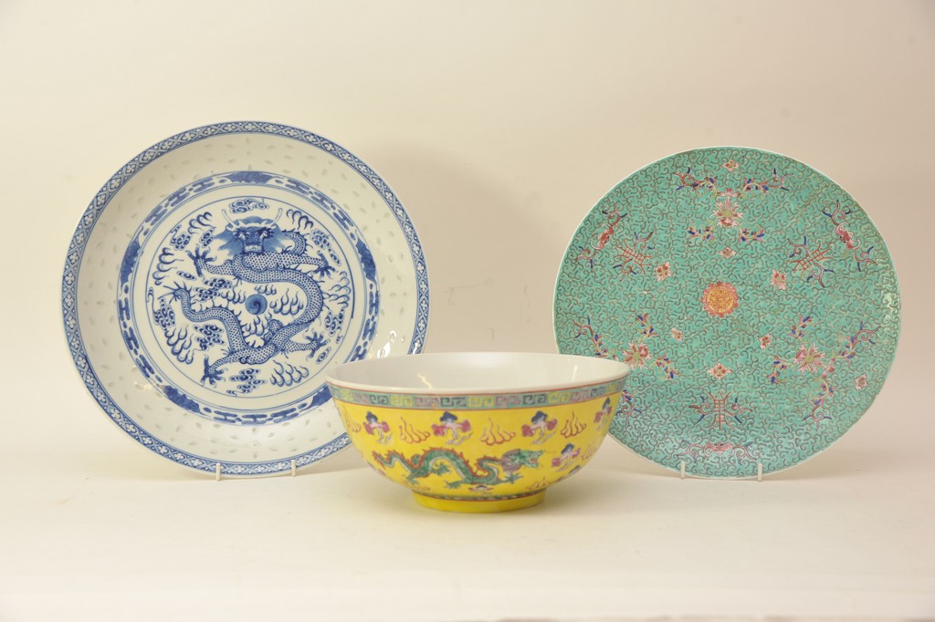 A Chinese 20th century famile jaune yellow glazed bowl and two blue and white dishes (3)