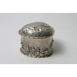 A quality silver gilt heart shaped trinket box, repousse decorated with a band of figures,