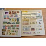 Two albums containing mint commonwealth postage stamps
