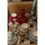 A collection of various ceramics and glassware.