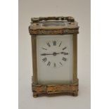 A brass cased carriage clock