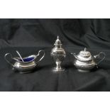 A miniature silver plated condiment set