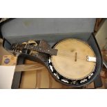 A cased banjo