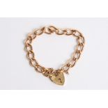 A 9ct gold bracelet with heart shaped padlock clasp