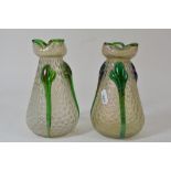 A pair of Loetz iridescent glass vases with raised and applied decoration.