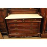 A continental walnut wash stand with a marble top above draws