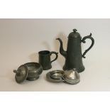 A collection of pewter items to include coffee pot, muffin dish etc (4 items).