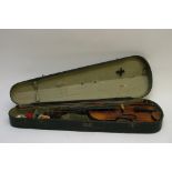 An old violin in wooden case
