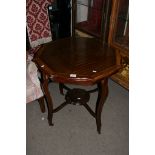 An Edwardian inlaid occasional table