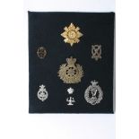 A collection of 8 cvarious badges including Royal Company of Archers