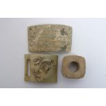 A collection of Chinese stone carvings including an archaic design cong,