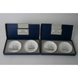 Two boxed sets of Royal Worcester dishes decorated with sailing ships and presented by Thos